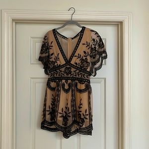 Honey Punch nude and black romper, size medium (4-6)